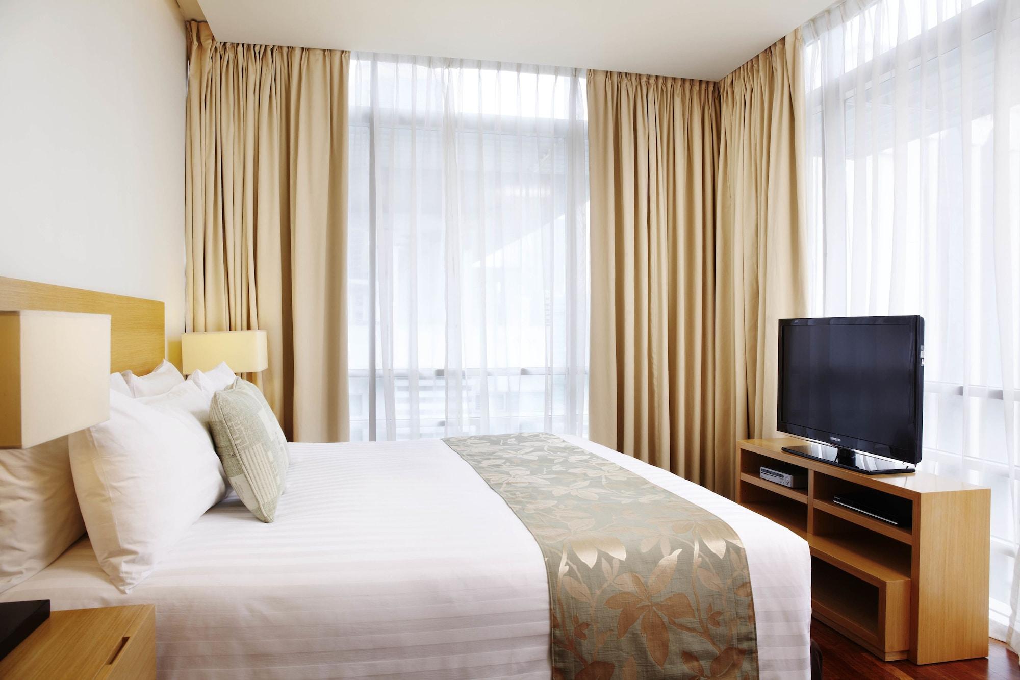 Parkroyal Serviced Suites Kuala Lumpur Exterior foto A bedroom at the hotel