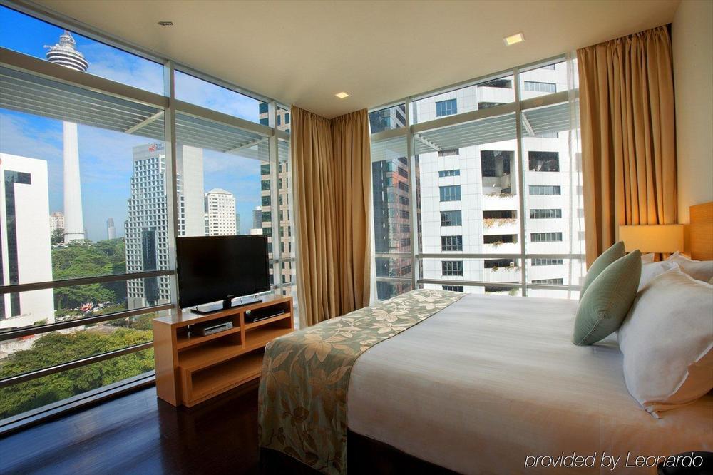 Parkroyal Serviced Suites Kuala Lumpur Quarto foto A bedroom at the hotel