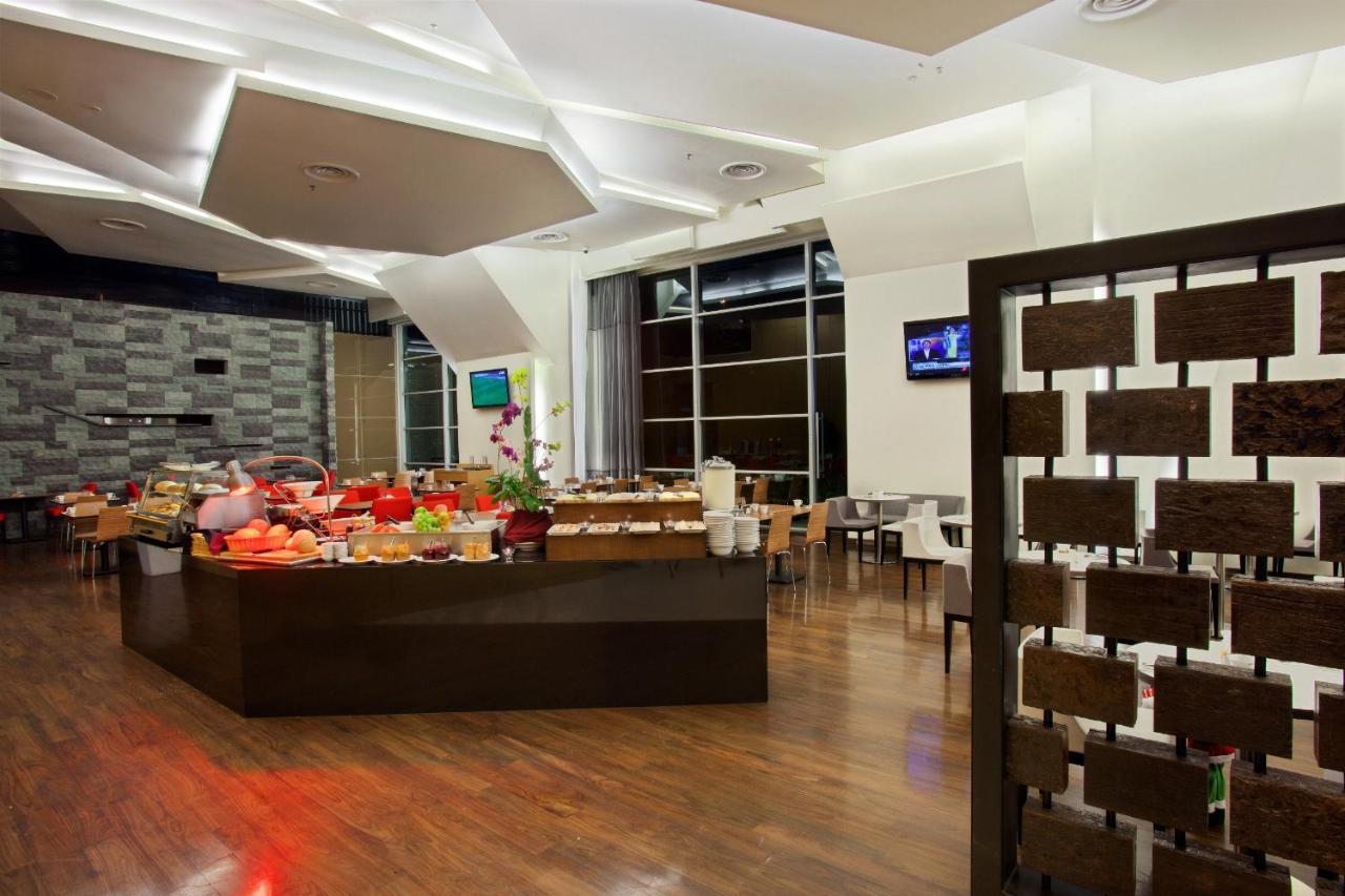 Parkroyal Serviced Suites Kuala Lumpur Exterior foto The interior of the restaurant